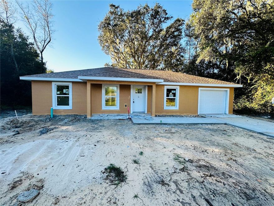 Under Construction. Back on the market. Under Construction on this cute 3/2 Block & Stucco home in a quiet, growing area in Summerfield. Just minutes from Belleview, The Villages and I-75. Enjoy the open concept floor plan, Kitchen has granite counter tops and stainless steel appliances including Range Refrigerator, dishwasher and microwave. Vinyl plank flooring throughout. Tray Ceiling and Walk in closet in Master Bedroom.