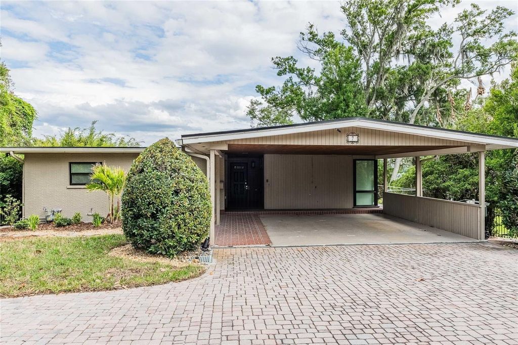 Photo of 7 Lake Hollingsworth Drive, Lakeland, FL 33803 (MLS # L4961462)