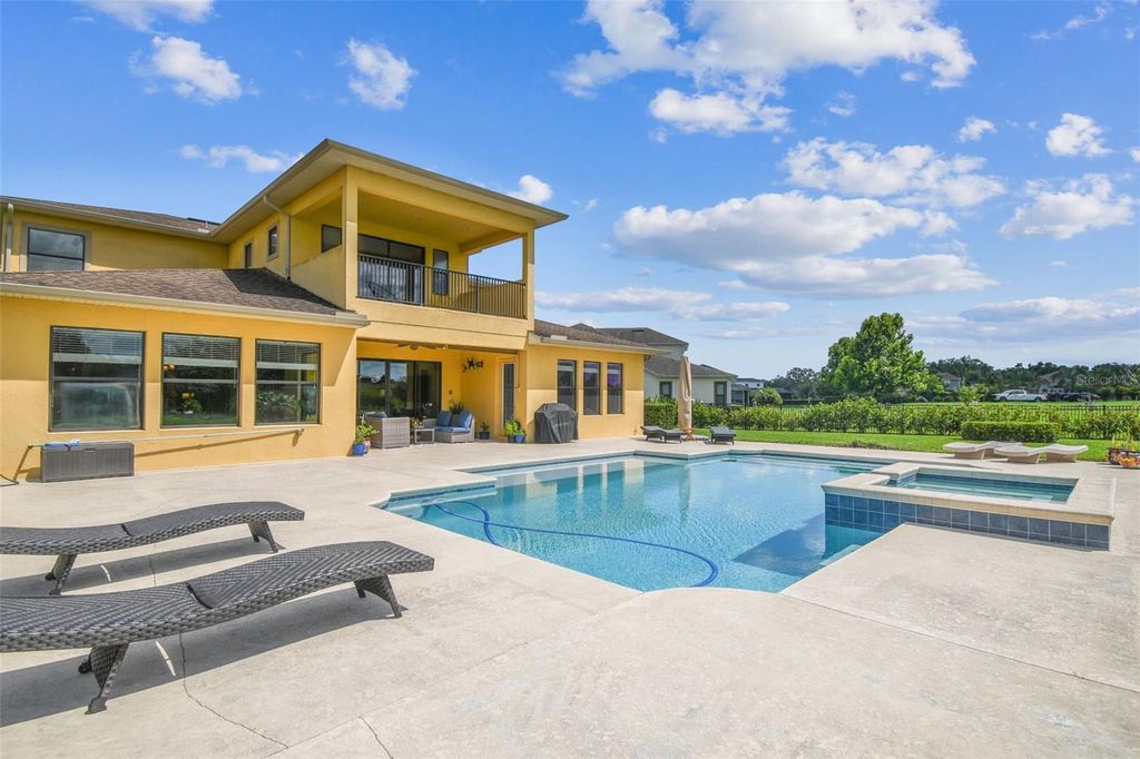 Photo of 17914 Howsmoor Place, Lutz, FL 33559 (MLS # TB8401273)