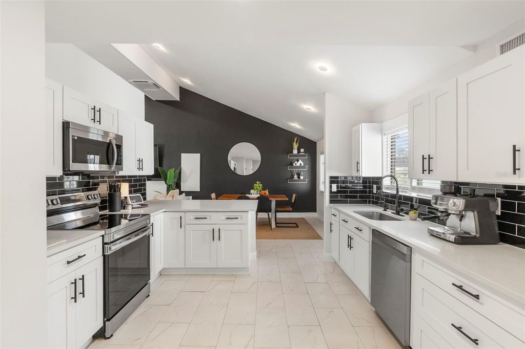 Photo of 1008 Michigan Boulevard, Dunedin, FL 34698 (MLS # TB8459085)