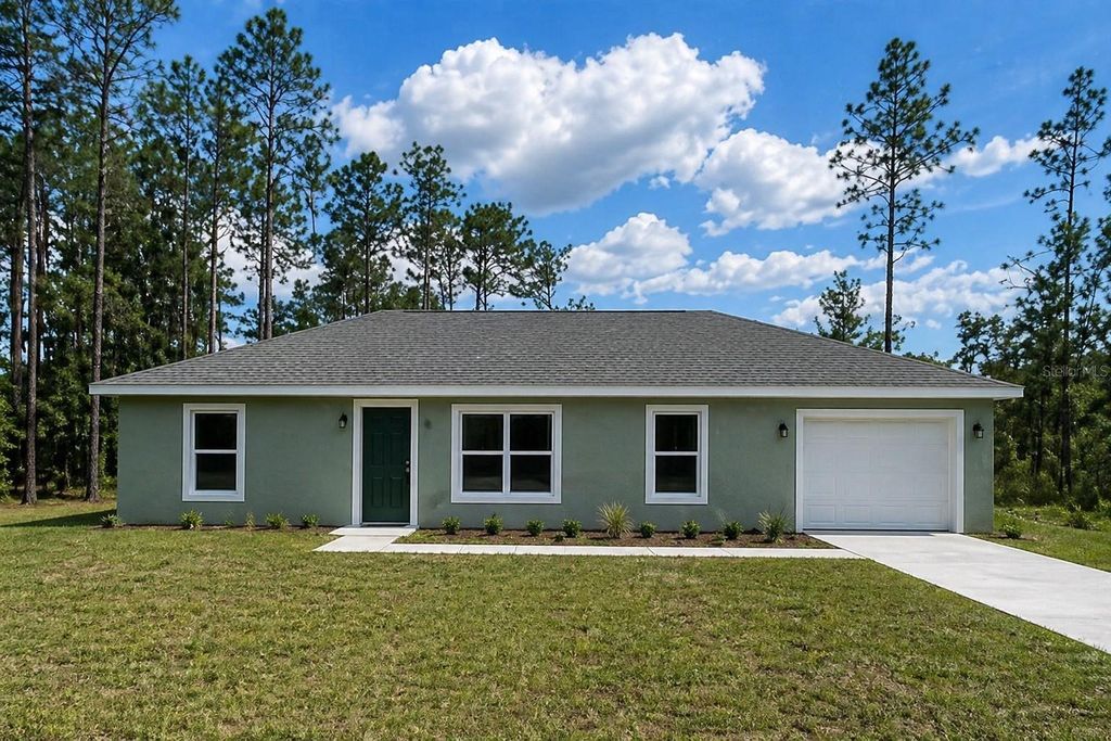 Photo of 24202 NW Aspen Lane, Dunnellon, FL 34432 (MLS # A4691787)