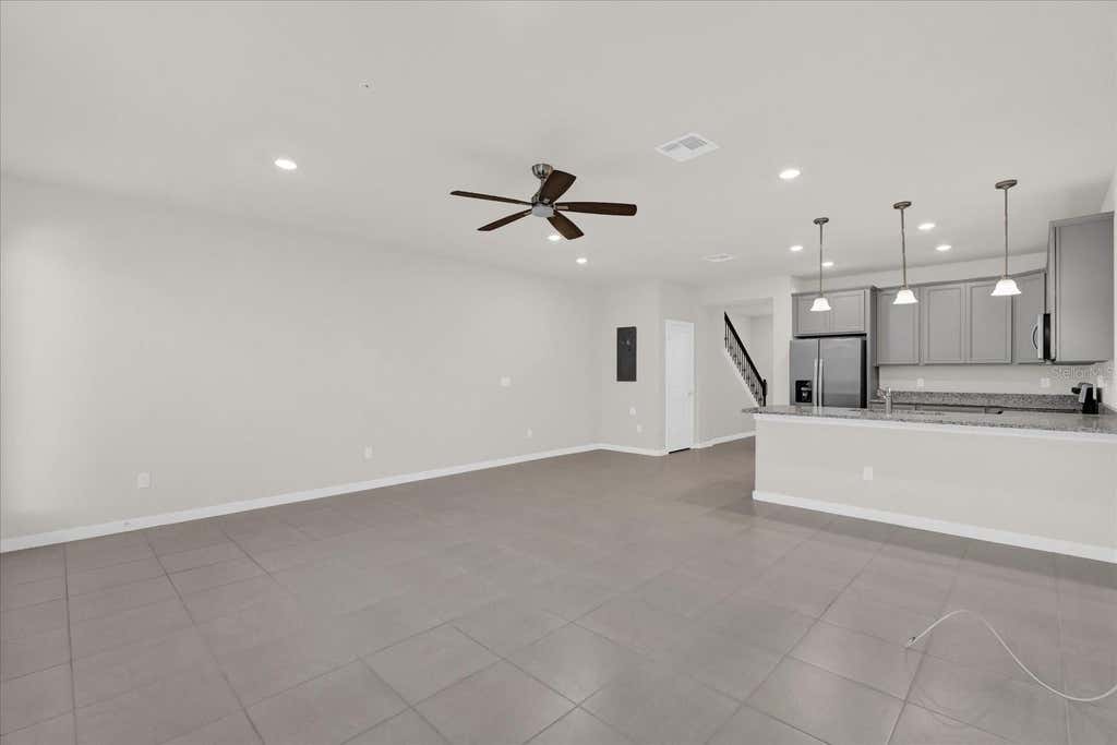 Photo of 10877 Wooded Acre Alley, Orlando, FL 32829 (MLS # O6431808)
