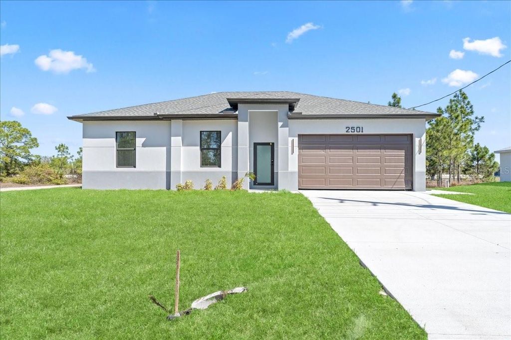 Photo of 2501 E 15th Street, Lehigh Acres, FL 33972 (MLS # A4688536)