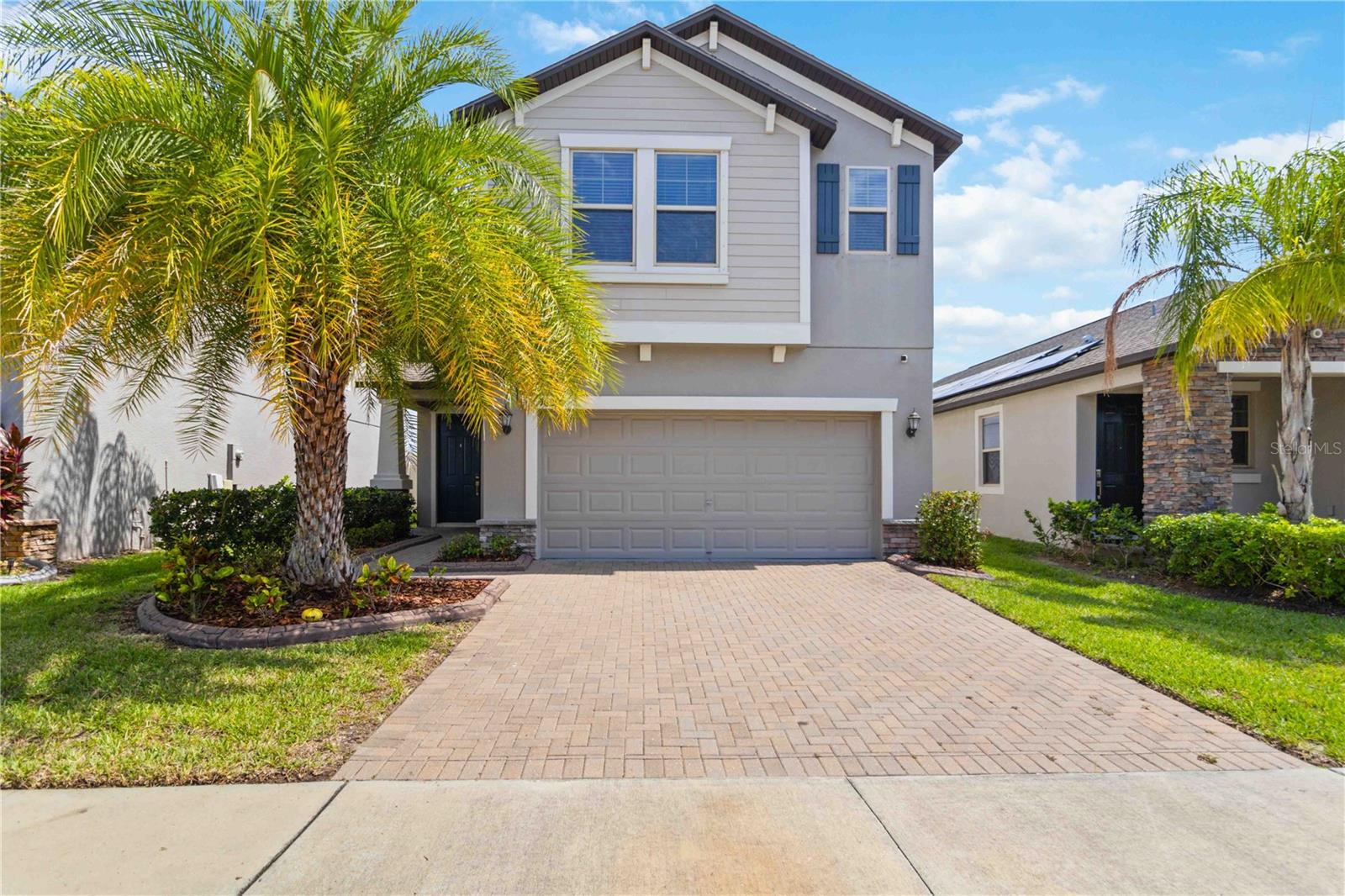 Discover the comfort and convenience of this spacious 4-bedroom, 2.5-bath home located in a vibrant, amenity-rich community just a short drive south of Tampa. With 2,859 square feet of interior space, this two-story home offers modern upgrades and room to grow. Luxury vinyl flooring replaces all carpeting on the stairs and upper level, offering durability and style. The kitchen and bathrooms are fitted with elegant granite countertops, providing both function and a timeless look.
The layout includes a bonus loft area upstairs—perfect for game nights or movie marathons—as well as a den or study for work, creativity, or the occasional hide-and-seek champion. The fully fenced backyard adds a private outdoor space ideal for relaxing or entertaining.
This home features a 3 year old 15.795kW owned solar panel system (not leased or financed, over a $71K value!) that has 22 yrs left on the warranty, keeping monthly electric bills refreshingly low—averaging $50 or less. That’s more savings for weekend adventures or your coffee habit.
Just a few blocks away, you'll find Belmont Elementary and the community amenities center offering two pools, a dog park, a playground, basketball and tennis courts, and scenic walking trails. Nearby attractions include a large neighborhood park, a Publix supermarket, and a highly-rated high school, all within a short walk or quick drive.
Perfectly positioned for easy access to daily essentials and weekend escapes, this home blends relaxed Florida living with smart upgrades. If comfort, convenience, and energy efficiency are on your checklist, this residence may just check all the boxes—with a few extras, too.