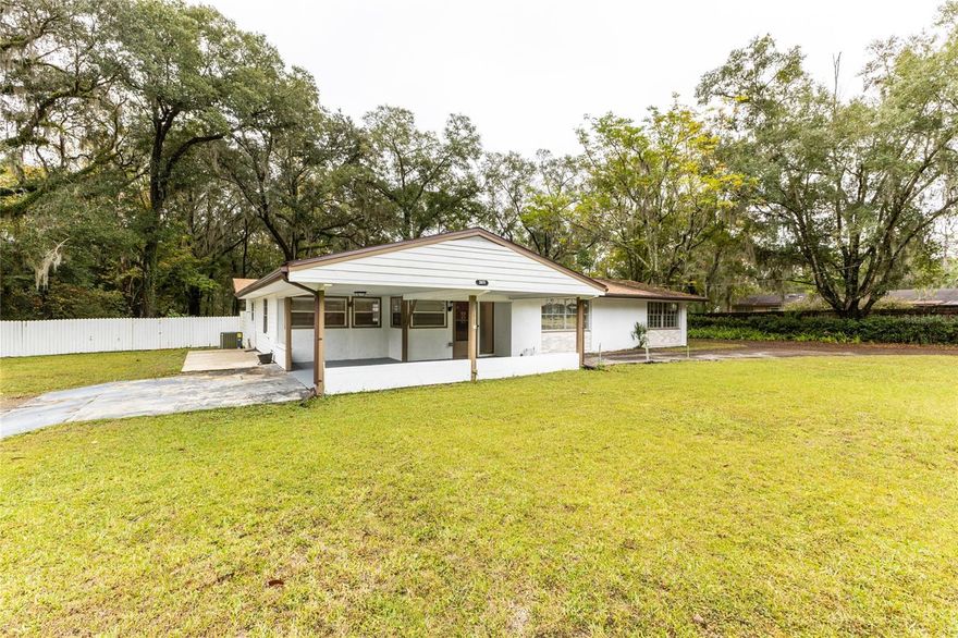 Enjoy the Florida lifestyle in an upgraded home perfect for entertaining. This home has many desired features and even a bar room to enjoy the game. This home sits in an excellent Location in Gainesville Right off 39th Avenue and 13th Street, very close to campus. The features include a covered front entry with large front porch, big covered back porch over looking the screened pool and extra large pool deck, a spacious open floor plan, with an extra large laundry room and mudd room. The home sits on a large lot with a long circular driveway. There are plenty of open spaces in this home to enjoy! There is even a Shed in the Backyard which is included. Hurry this Gainesville Pool Home won't be available long!!