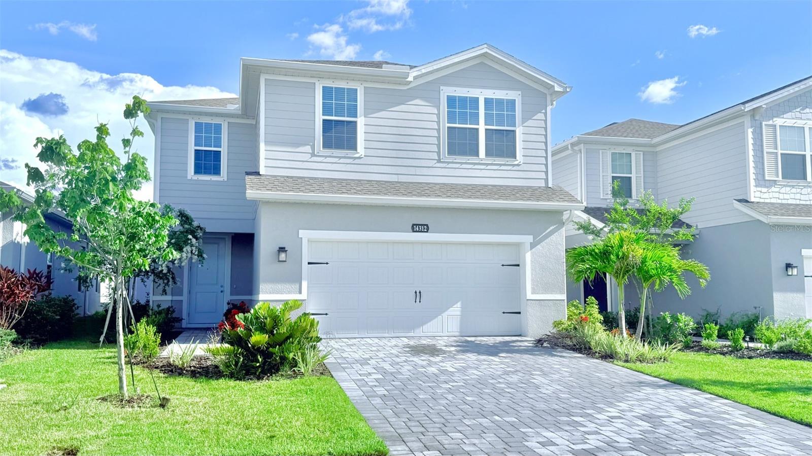 Welcome to this 2024 Built Home with 4 Beds, 2.5 Baths & 2 Car garage. No need to wait to build as this home is 1 year young and priced below the builder's. The modern and open floor plans boasts a Large Kitchen Island with Quartz counter tops, Stainless Appliances, Ceiling Fans, LVP flooring, Insulated Windows, GE Washer and Dryer, Fully Fenced Yard, Rain Gutters, Beautiful Plants, and much more is READY and in Move-In condition NOW before school starts......Lakewood Ranch is a Great Neighborhood with year round events. Your new home will be just minutes from Dining, Excellent Schools, Vibrant Shopping, Healthcare, Nature Trails, Parks, and recreation. There are Youth programs with sports, fitness, arts and entertainment. The Community Park a few steps away. Not a Dull Moment Here.....Low HOA and NO CDD fees, make this an excellent investment as your next home. Come look today before its gone!***Some photos are virtually staged!