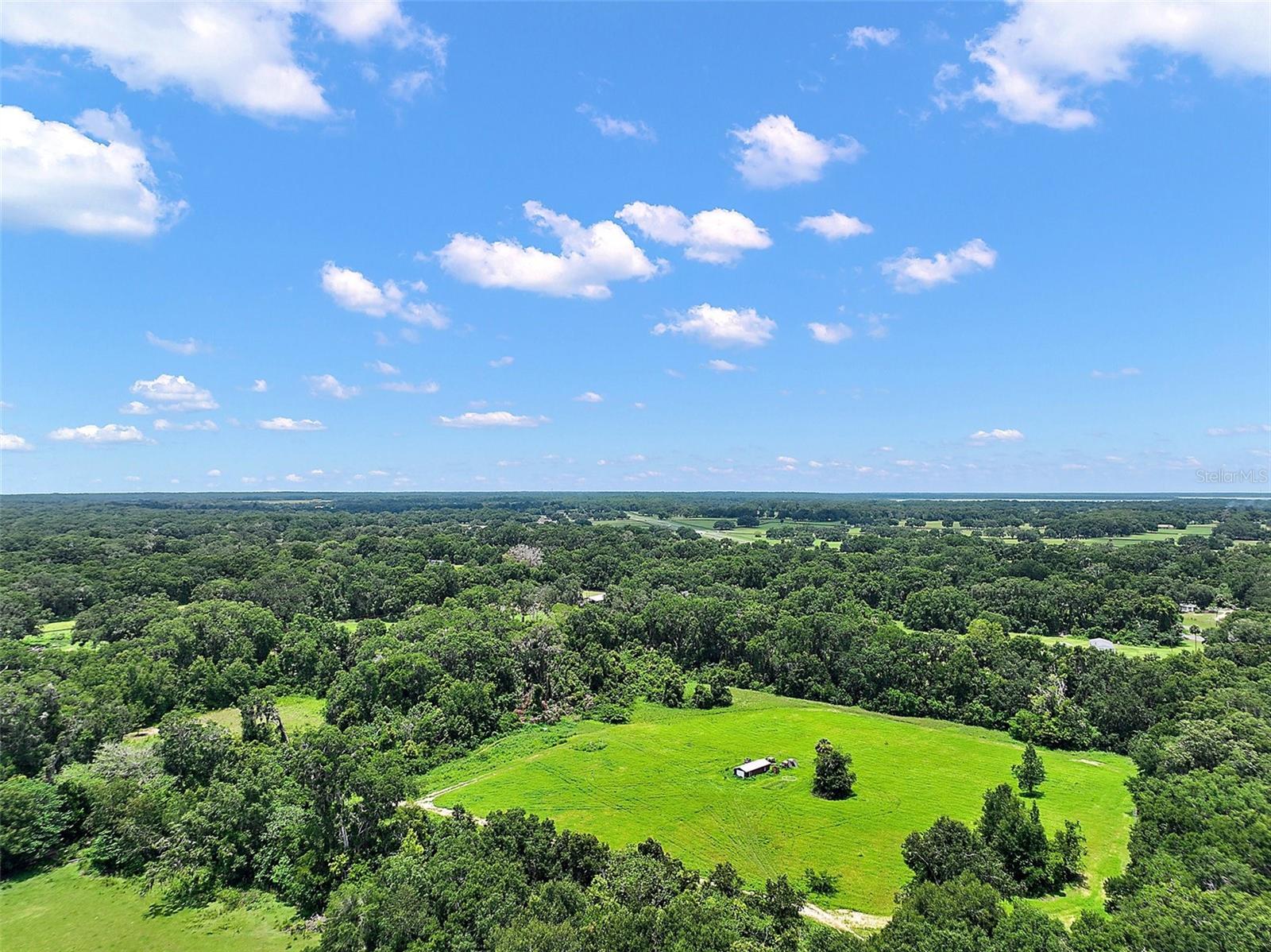 Land priced to sell quickly! Don’t miss this great opportunity to own 5 acres of A1-zoned land, ideal for agricultural use. This zoning permits a variety of agricultural and related activities, as well as certain residential uses, including single-family homes, manufactured homes, and agricultural support structures. The property features an existing well and a generously sized shed for storing equipment. The land is mostly cleared and conveniently located near Highway 441, offering both accessibility and versatility. Whether you're looking to build your dream home, start a small farm, or raise livestock, this property provides the perfect setting.