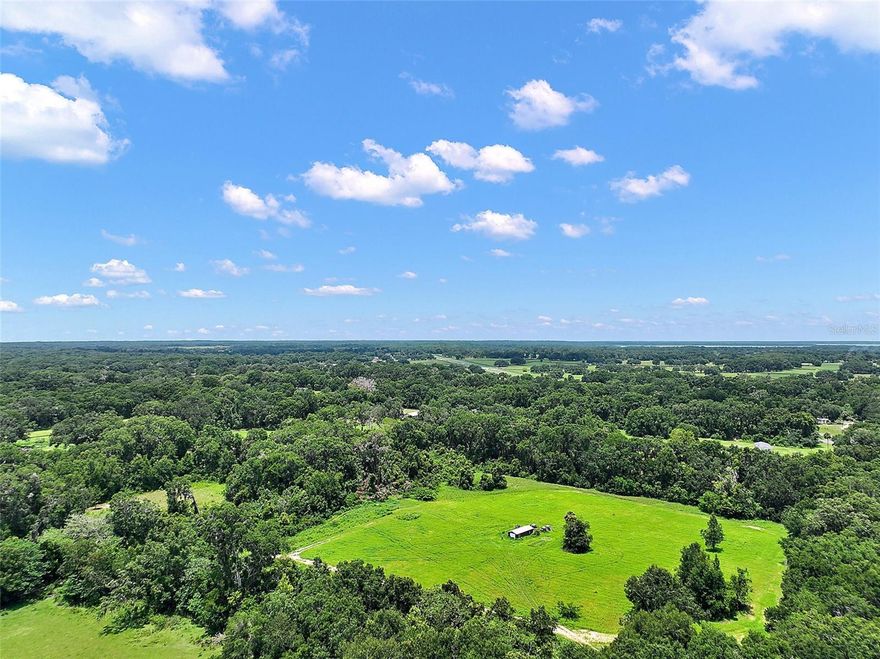 Land priced to sell quickly! Don’t miss this great opportunity to own 5 acres of A1-zoned land, ideal for agricultural use. This zoning permits a variety of agricultural and related activities, as well as certain residential uses, including single-family homes, manufactured homes, and agricultural support structures.  The property features an existing well and a generously sized shed for storing equipment. The land is mostly cleared and conveniently located near Highway 441, offering both accessibility and versatility.  Whether you're looking to build your dream home, start a small farm, or raise livestock, this property provides the perfect setting.