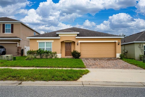 Photo of 429 Ogelthorpe Drive, Davenport, FL 33897 (MLS # O6442931)