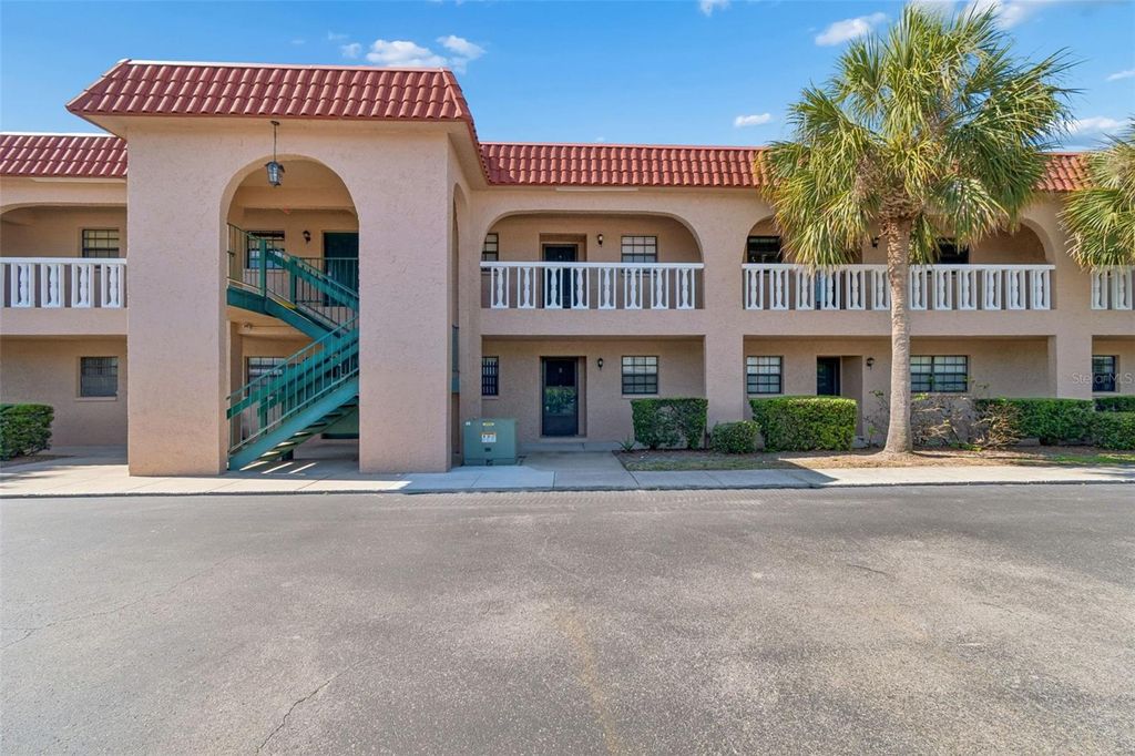 Photo of 1750 Belleair Forest Drive #A5, Belleair, FL 33756 (MLS # TB8502394)