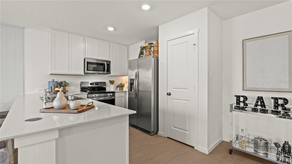 Photo of 4301 Riverbend Boulevard, Haines City, FL 33844 (MLS # O6436770)