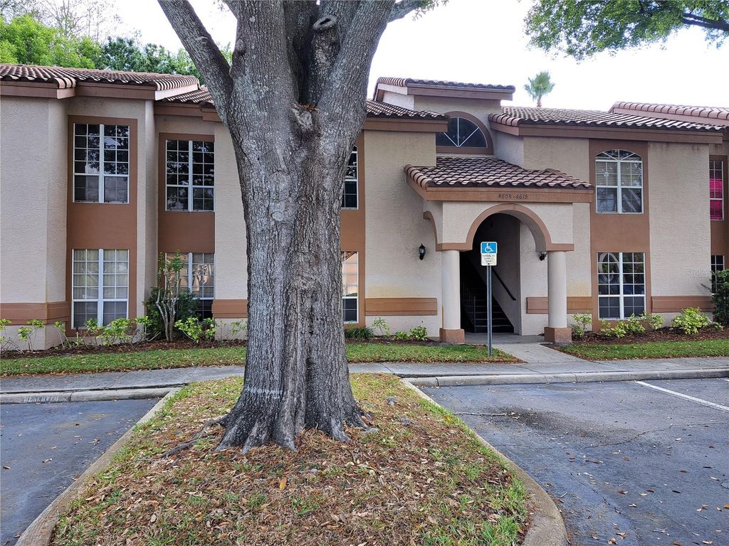 Photo of 4613 Gate Place #104, Orlando, FL 32811 (MLS # O6393567)
