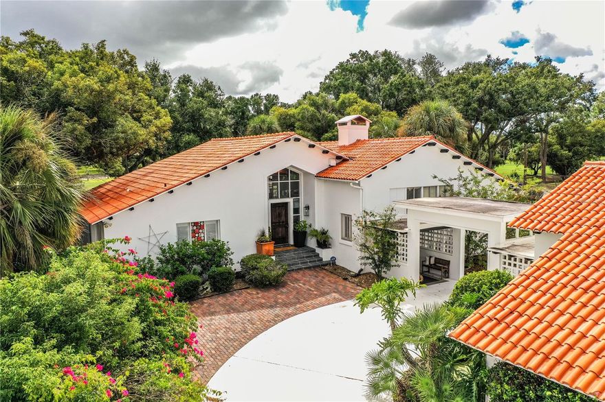 Auction Property. AUCTION!  THE LIST PRICE IS THE SUGGESTED OPENING AUCTION BID!
6PM, Friday, November 14th
The Grande Dame of Lone Palm Golf Club – A Rare Opportunity Awaits

If you're searching for cookie-cutter, keep scrolling. But if you crave character, craftsmanship, and prestige—welcome home.
This one-of-a-kind Mediterranean-inspired estate is a true architectural standout, set in the exclusive Lone Palm Golf Club community. With an estimated replacement value of over $2 million, this stately residence is now available for the discerning buyer who values uniqueness, privacy, and the art of entertaining.

Key Features:
4 Bedrooms | 2.5 Baths | Multi-Level Layout Plus a 4-car garage!
Over 6,300± sq ft under roof with 3,500± sq ft of refined living space
Soaring 20-foot cathedral ceilings
Striking 325-gallon freshwater aquarium as a central living room feature
Expansive 1,300± sq ft elevated veranda with 15’ ceilings—perfect for hosting up to 50 guests
Custom windows offering panoramic views of Lone Palm’s signature 13th hole

Exceptional Grounds & Entry:
5,000± sq ft of imported Portuguese tile
Freestanding 1,100± sq ft 4-car garage, plenty of room for your toys!
Elegant 4,200± sq ft private courtyard
Grand entry through a one-of-a-kind medieval-style door

Lifestyle & Community:
Become part of an exclusive neighborhood featuring:
Championship-level golf
A brand-new, multi-million dollar pickleball complex with 13 courts
An on-site, state-of-the-art sports bar and grill
This is not just a home—it’s a lifestyle statement. A place where luxury, leisure, and legacy meet.

Now available for private showings. Experience the unmatched charm and elegance of The Grande Dame of Lone Palm before she’s gone.