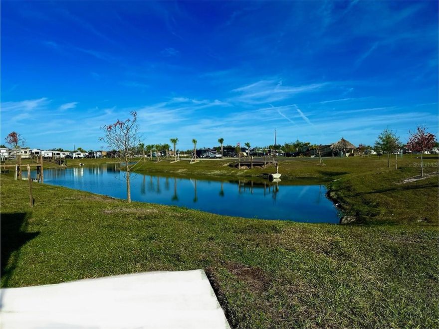 Experience elevated luxury RV living with this exceptional resort lot in the newly developed Palm Breeze RV Resort Community. Ideally located just off I-75, it offers quick highway access and is only minutes from Florida’s beautiful beaches. 

RV enthusiasts enjoy a full suite of upscale amenities, including a large heated resort-style pool and spa, beautiful spacious clubhouse with fitness center and camp store, newly built pickleball courts, cornhole, shuffleboard, and a dedicated playground area. The modern clubhouse is fully loaded with recreational options such as pool tables, table tennis, card tables, foosball, and more — designed to support both active and social lifestyles. 

Each lot includes complete utility connections with water, sewer, and electric already in place for seamless setup. This particular site is positioned beside a water feature, delivering attractive water views and added desirability. It is a deeded RV lot with a natural relaxing wter view, providing a quiet, private atmosphere.

Investment opportunity - the Palm Breeze Resort staff advertize, take calls and book rentals for your lot when you join the shared revenue program.

A rare combination of resort amenities and natural surroundings — built for premium Florida living.