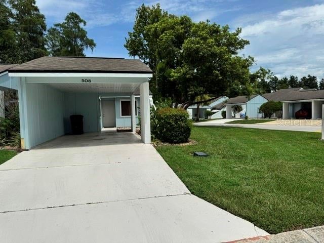 Photo of 508 Prestwick Place #1, Poinciana, FL 34759 (MLS # O6436725)