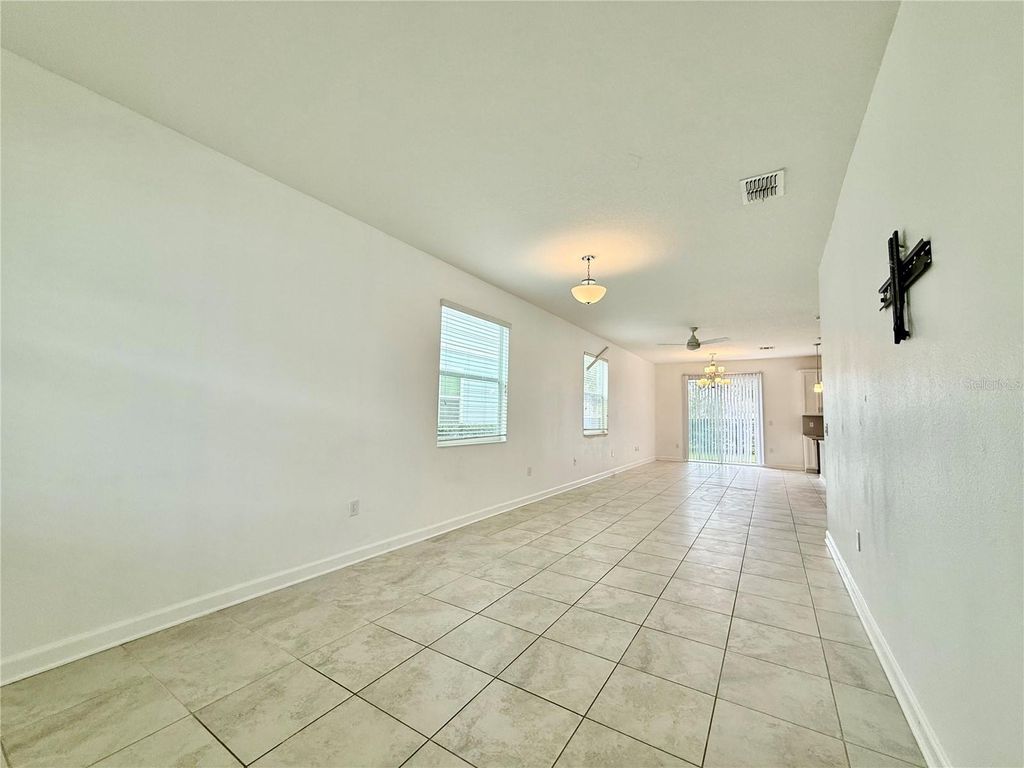 Photo of 4712 Tribute Trail, Kissimmee, FL 34746 (MLS # O6396348)