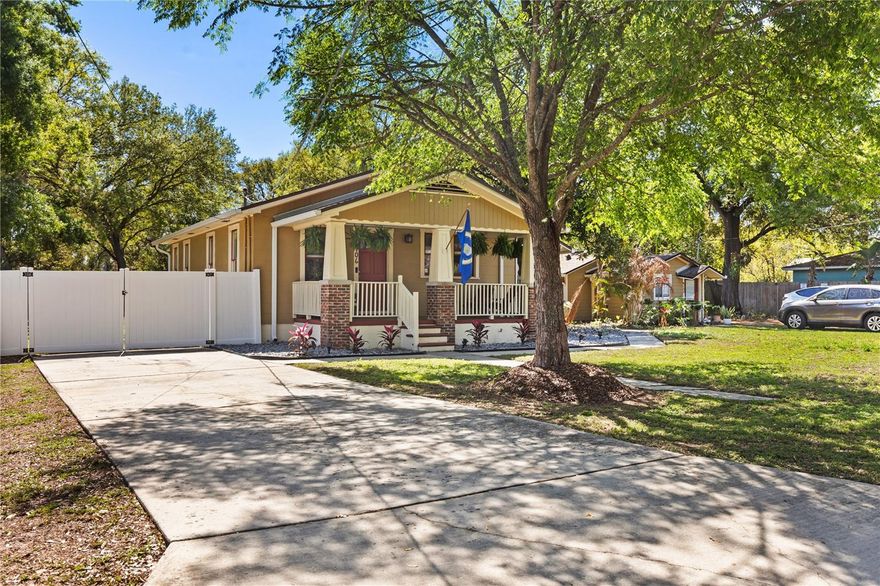 Picture-perfect Craftsman Bungalow nestled on nearly 1/4 acre in South Seminole Heights, offering timeless charm and impeccable curb appeal. Set back from the street, this home welcomes you with a cozy front porch and a peaceful screened side porch tucked just around the corner—perfect spots to unwind. Located on a quaint, quiet street yet only minutes from I-275, you’ll enjoy easy access to some of the area’s best dining and breweries. Walking or biking to local favorites is a breeze. Step inside to a bright, open floor plan that blends the large eat-in kitchen with a warm and inviting family room. An additional flexible living space makes an ideal office, play area, or reading nook. The two spacious bedrooms are filled with natural light, one featuring a walk-in closet and the other offering two closets for ample storage. Original glass doorknobs and classic plaster walls highlight the home’s authentic Craftsman character, while rich Dark Hickory luxury laminate flooring elevates the main living areas. The beautifully updated bathroom includes a newer vanity, stylish lighting, and eye-catching mosaic tile flooring. Interior laundry with a full-size stackable washer and dryer adds convenience. Outside is where this home truly shines. Sitting on nearly a 1/4 acre, the fully fenced backyard offers endless possibilities, plenty of room for gardening, outdoor living areas, a play set, pets, or even space to add a pool. A storage shed provides extra room for tools and equipment, and the expansive lot accommodates RV or boat parking with ease. Even better, the backyard offers alley access, making parking, unloading, or future projects incredibly convenient. Just blocks away you’ll find The Independent, Angry Chair Brewery, Spaddy’s Coffee, local shops, and a neighborhood park. Situated outside the flood zone yet only a short stroll to the waterfront at Rivercrest Park, you can enjoy sunsets, fishing docks, a canoe launch, picnic areas, a playground, and over a mile of scenic walking trails. Armature Works and the Tampa Riverwalk are just 2 miles away, while Downtown Tampa and Curtis Hixon Park, Al Lopez Park, Ybor City, and Raymond James Stadium are all within 3 miles. This central location truly puts you close to it all.