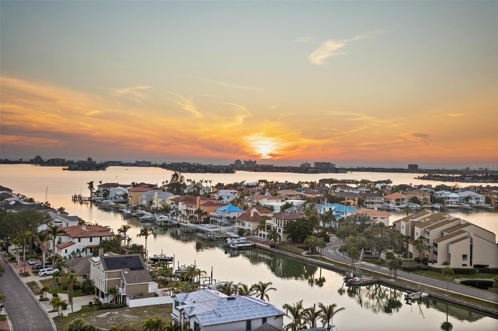 Elevate your lifestyle with luxury living in the sought after Pelican Bay Yacht Club Building A. This 10th level condominium offers a blend of comfort, space, and a rare opportunity for you to make it your own. Located in the waterfront boating and golf resort community of Pasadena Yacht & Country Club. This condo boasts breathtaking views of the Intracoastal Waterway and the Gulf of Mexico, perfect for enjoying beautiful sunsets right from your expansive balcony. As soon as you walk through the door of this condo you will realize all the large roomy spaces to take in the spectacular views below. This 2 bedroom 2 bath flat embodies endless potential ready for your unique touch. Enjoy the serene waterfront on the 33 foot long private covered balcony that can be accessed from the great room and the primary bedroom. The foyer entry sets the stage with an expansive view that leads to the great room with wall to wall sliding glass. In the oversized kitchen you will have plenty of space to cook and entertain. The breakfast bar is perfect to enjoy your morning coffee while enjoying the sites. The home has two primary bedrooms with ensuite baths, both featuring spacious walk-in closets. This primary suite is tucked away with a private entrance to the balcony. Your laundry center is conveniently located in between the two bedrooms. The oversized 2nd bedroom has views of the PYCC marina, golf course and clubhouse. It is easy to have a bed, a sofa, and an office desk in this large bedroom. Immaculate Building A, a no pet building, has secured entrances, reserved garage parking, impressive 2 story lobby with spiral staircase, billiards, library, exercise room and the Commodore’s Community Room. This building was constructed by US Steel and has passed its Milestone and SIRS inspections with flying colors! The park-like grounds, tranquil pond with lit flowing fountain, heated and chilled pool, in-ground spa, saunas, clubhouse & pickle ball courts will help you relax! The new owner of this home will have the amazing opportunity to jump to the top of the long wait list and become a member of the exclusive golf club! As a member you will enjoy excellent amenities of the Pasadena Yacht & Country Club – a Championship Golf Course, health club, Olympic size heated and chilled waterfront pool, tennis courts, an 82 slip marina, fine dining, casual dining, and a poolside bar. Whether you’re teeing off with the pro golf instructor, enjoying a meal in one of the country club’s three dining rooms, or unwinding with a round of tennis, this community offers everything you need for a vibrant and active lifestyle. For added peace of mind, enjoy 24-hour guard services in this golf cart-friendly community. Embrace the ease of living with regular community events, and take advantage of the quick drive to local hotspots such as St. Pete Beach, Treasure Island, Gulfport’s artsy downtown, and the bustling downtown St. Petersburg. With convenient access to Tampa and Clearwater Airports (just 30 minutes away) and all the excitement downtown St. Pete has to enjoy, this condo provides the perfect combination of relaxation, recreation, and proximity to everything you desire. Make this dream home your reality and live where luxury meets lifestyle.