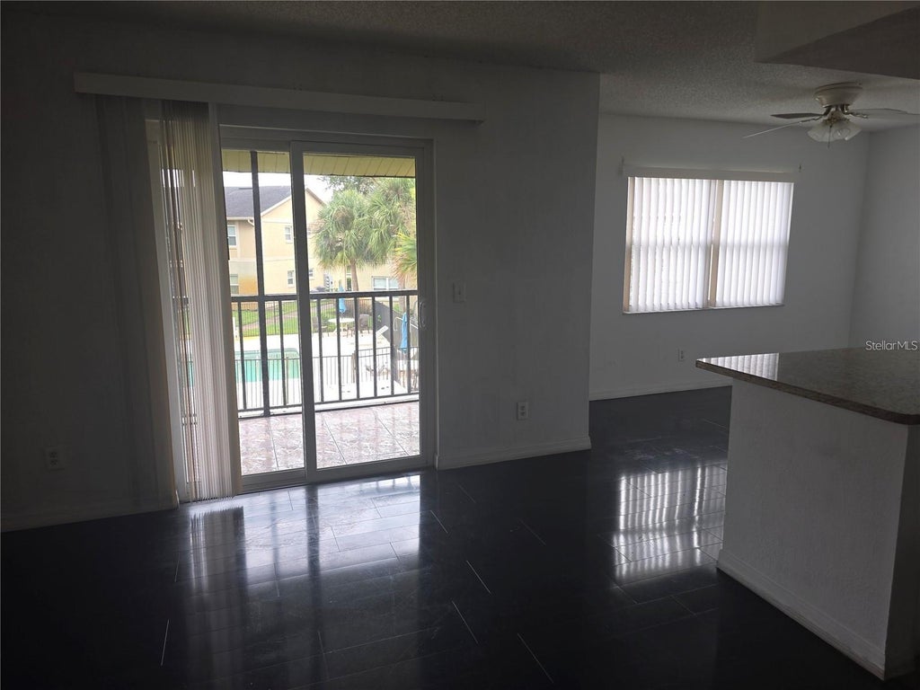Photo of 9831 Barley Club Drive #4, Orlando, FL 32837 (MLS # S5159786)