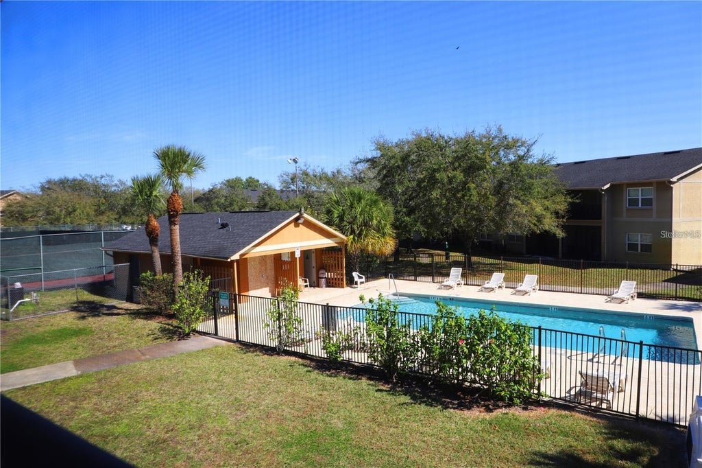 Photo of 9831 Barley Club Drive #4, Orlando, FL 32837 (MLS # S5159786)