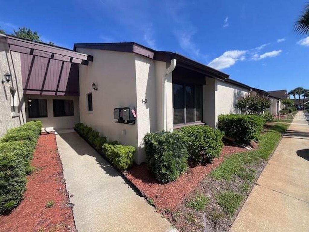 Photo of 101 Grand Plaza Drive #I20, Orange City, FL 32763 (MLS # O6401060)