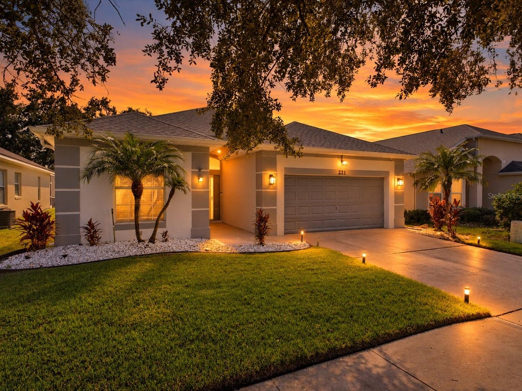 Photo of 221 Westmoreland Circle, Kissimmee, FL 34744 (MLS # O6450831)