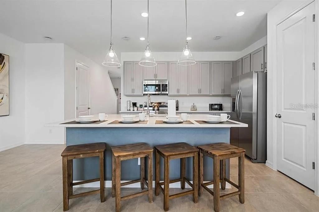 Photo of 634 Longboat Dr, Davenport, FL 33896 (MLS # O6379978)