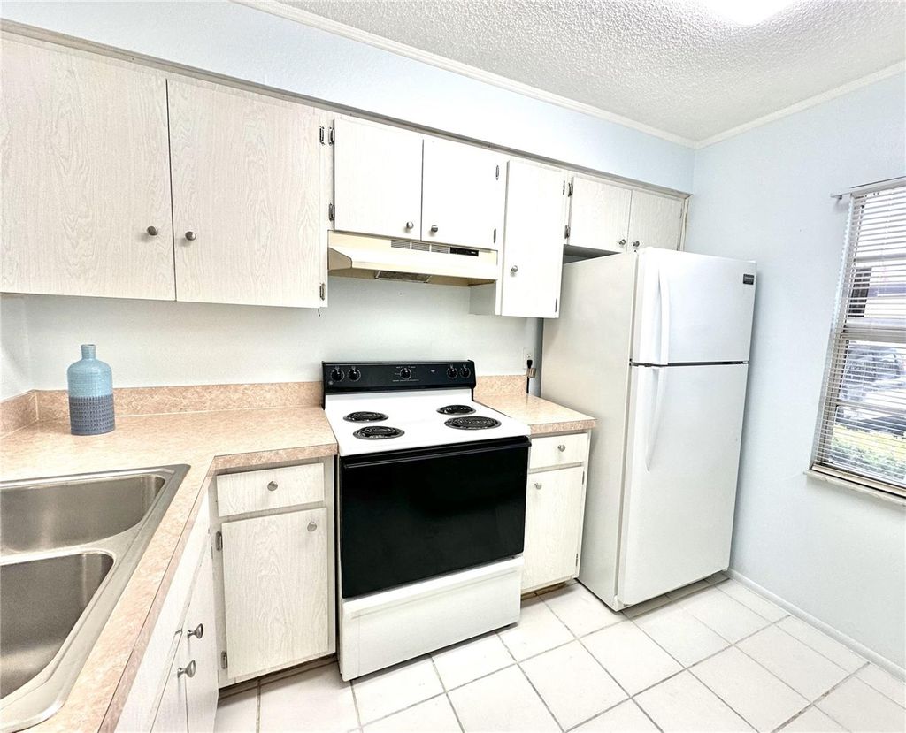 Photo of 13926 Mission Oaks Boulevard, Seminole, FL 33776 (MLS # TB8394068)