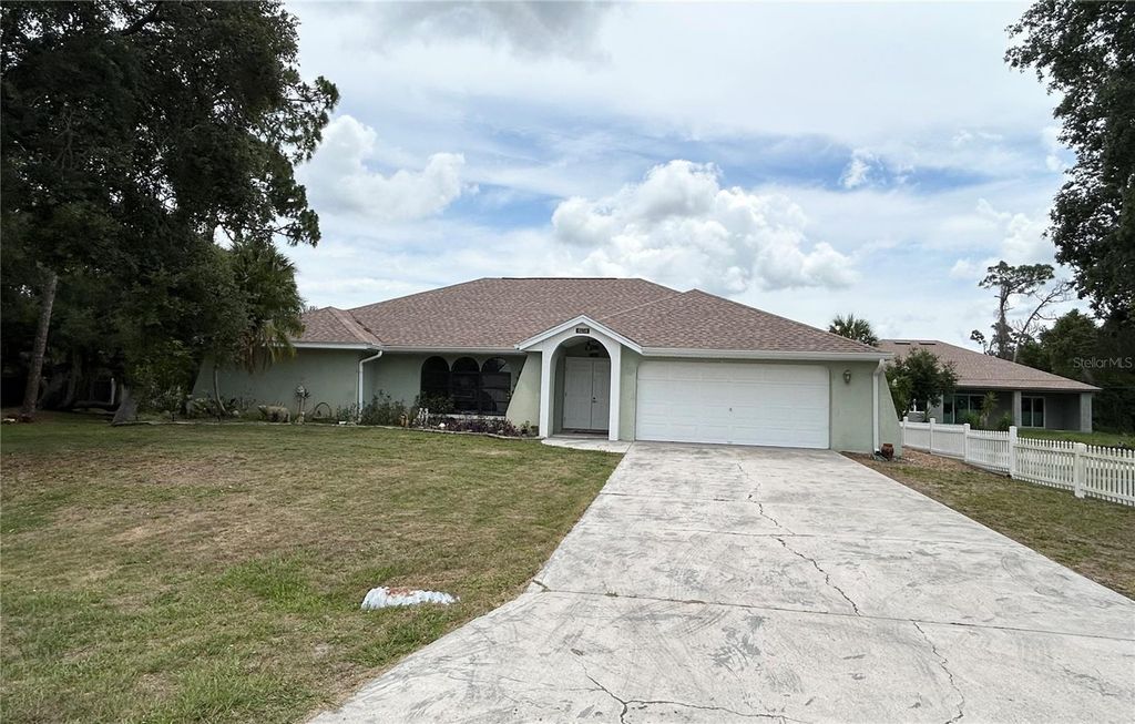 Photo of 1034 Kensington Street, Port Charlotte, FL 33952 (MLS # C7527145)