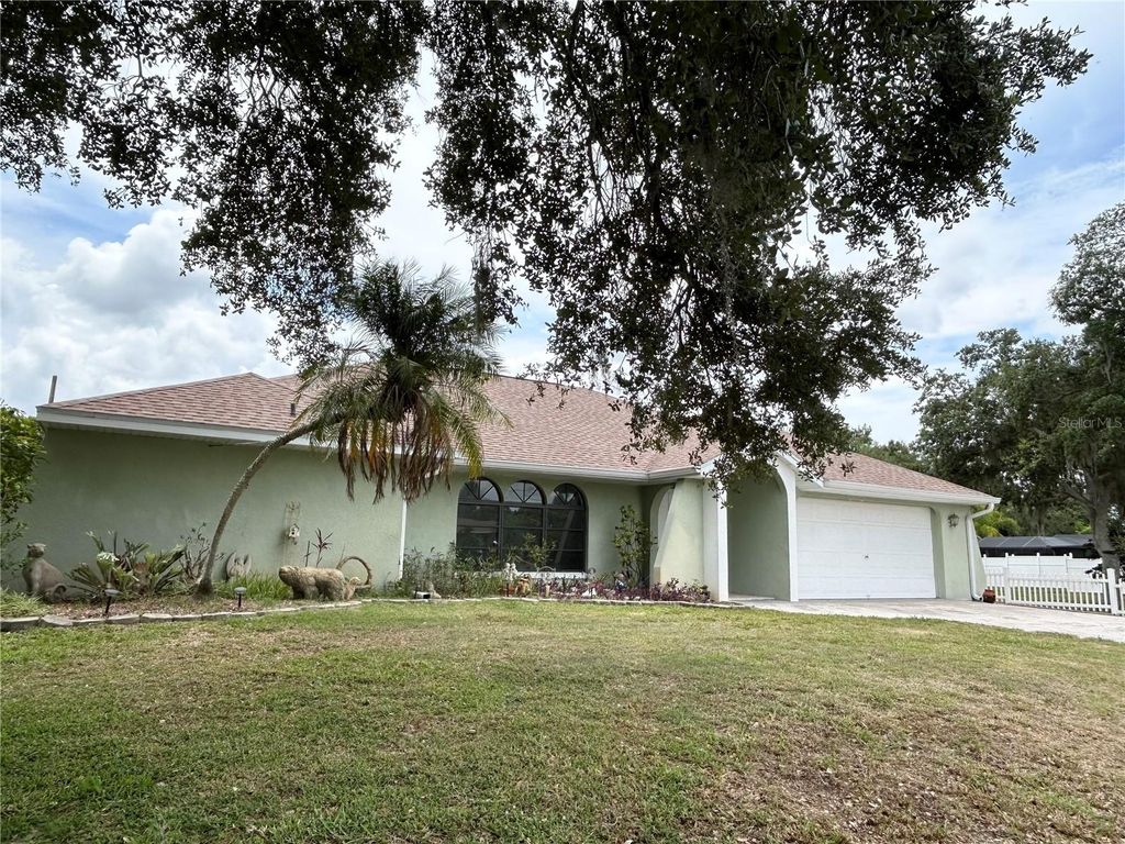 Photo of 1034 Kensington Street, Port Charlotte, FL 33952 (MLS # C7527145)