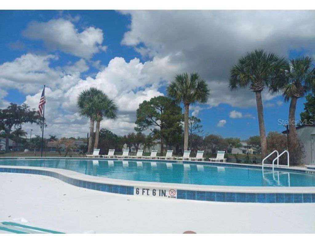 Photo of 2250 Candlewood Lane E, New Smyrna Beach, FL 32168 (MLS # O6399832)