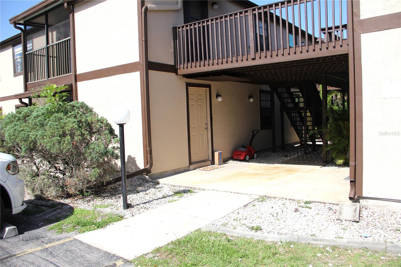 Look at this 1st-floor condominium in the 55+ community of Cedar Woods, no stairs to walk up.. Known for their wooded, park-like setting! Heated community pool close to the condo. Clubhouse with community meetings, special events, and much more. All tile throughout the unit. Newly updated kitchen with quartz counters. Newer bathroom cabinets. The primary bedroom has an ensuite bathroom with a walk-in shower and a walk-in closet. Hot water replaced (2022), A/C Unit replaced in (2020), Plumbing all repiped in (2016), and the upper unit above all repiped (2025). The laundry room is inside the unit. Designed a parking spot in front and one guest spot. No pets allowed according to association rules. Close to many Medical facilities, historic downtown Punta Gorda featuring many community events, Charlotte Harbor, restaurants, shopping, Sunseeker Resort, world-class fishing, boating, and golf courses. Come view this condo before it's gone..Schedule a showing today!