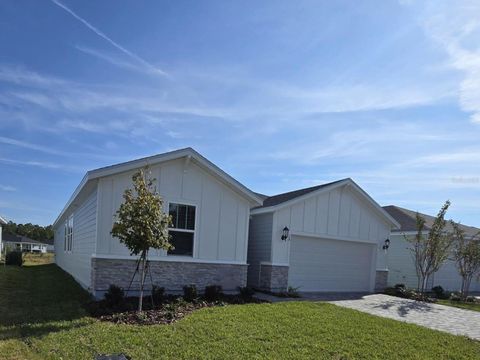 Photo of 16 Oconee Drive, Palm Coast, FL 32137 (MLS # O6360294)