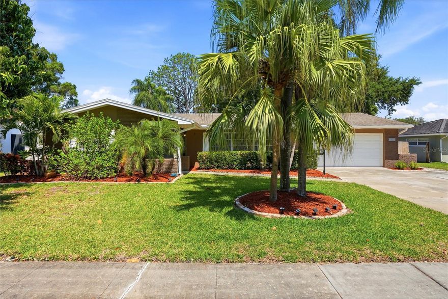 One or more photo(s) has been virtually staged. Excellent Buying opportunity! Located in the highly desirable Morningside Estates neighborhood, this beautifully maintained four bedroom, two bath home offers comfort, functionality, and an exceptional Florida lifestyle in an X flood zone. The attached two-car garage adds convenience and storage. A spacious updated kitchen showcases custom-designed cabinetry, stainless steel appliances and abundant storage, opening seamlessly to the inviting family room with built-in cabinets and shelving. Glass sliders lead to an expansive Florida room overlooking the sparkling in-ground pool, creating the perfect backdrop for year-round indoor-outdoor living. The private backyard retreat features extensive pool decking with plenty of space for lounging, dining and entertaining guests, while the large pool provides the ideal setting for cooling off on warm Florida days or hosting weekend gatherings. The spacious primary suite includes a walk-in closet and an updated ensuite bath with dual sinks. Ideally located minutes from world-famous Clearwater Beach, popular dining and shopping destinations with easy access to both Tampa and St. Pete, this home delivers the best of comfort, recreation and location. Come and see this amazing home today and make it yours tomorrow!