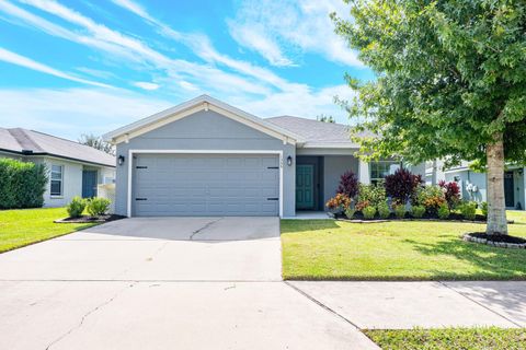 Photo of 1355 Windward Oaks Loop, Auburndale, FL 33823 (MLS # O6355965)