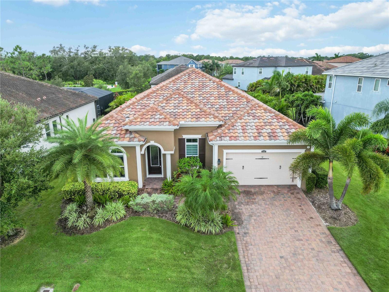 Immaculate 4-bedroom, 3.5-bath home located in the gated Arbor Grande community of Lakewood Ranch. This single-story residence features an open floor plan, two en-suite bedrooms, a 3-car tandem garage, and a cul-de-sac lot with a private, landscaped, and fenced backyard. Ideally situated near the community clubhouse, offering a Key West-inspired design with catering kitchen and event space, fitness center, resort-style pool and spa, sports court, and playground. Located in one of the nation’s premier master-planned communities, with convenient access to UTC, Waterside Place, and I-75. Pets considered on a case-by-case basis; additional fee applies.This home is move-in ready and offers the best of Florida living—schedule your showing today and secure it before it’s gone.