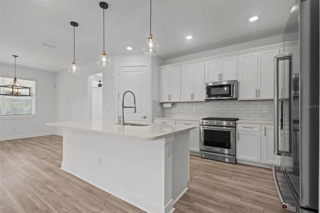 Photo of 18722 Sailors Delight Pass, Land O Lakes, FL 34638 (MLS # TB8409179)