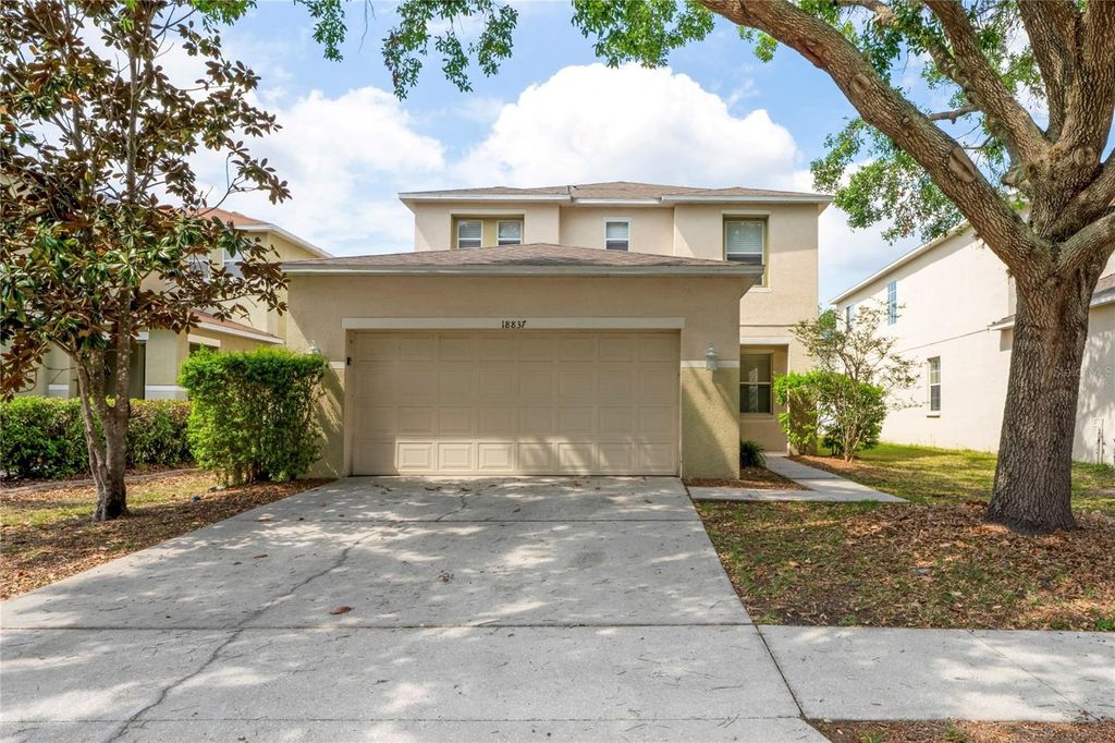 Photo of 18837 Litzau Lane, Land O Lakes, FL 34638 (MLS # TB8376223)