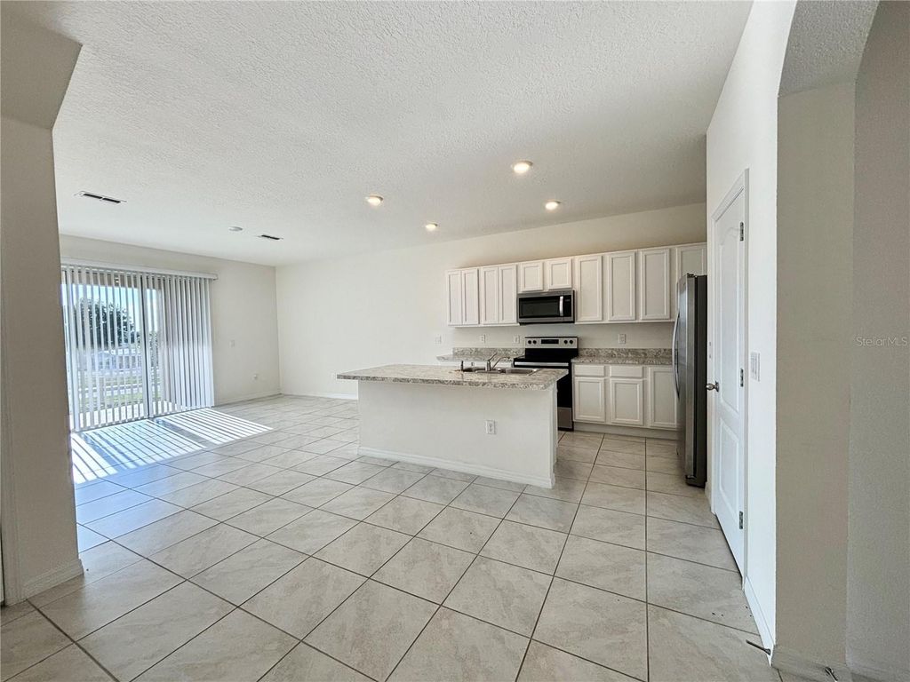 Photo of 401 Feltrim Reserve Boulevard, Davenport, FL 33837 (MLS # S5147922)