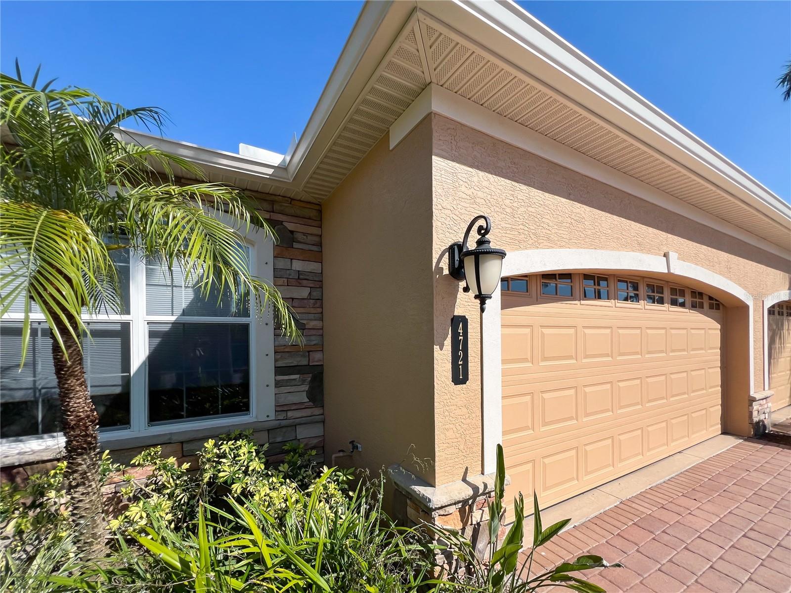 NEW PRICE MEANS EVEN GREATER VALUE! Make this affordable dream yours and experience a home where there is nothing more tranquil than sitting in the warm sun, watching the sunset, as the fountain sprinkles down to the pond! Add all of that to a villa in Florida and it's called paradise! The Turnberry Trace community offers the perfect blend of peaceful enjoyment in serene surroundings and accessibility to all the tourism you'd like to experience. Located in ever-growing North Port, you'll find yourself nestled between Sarasota and Punta Gorda, with wondrous beaches to the north and amazing fishing to the south. The villa itself offers a very spacious primary bedroom with en suite and walk-in closet, and two additional bedrooms for your guests to be equally as comfortable. This particular homeowner uses the third bedroom as a home office, allowing great work from home capability. The kitchen is well-appointed with solid wood cabinetry, granite counters, stainless appliances rounded off with an island breakfast bar. But of course, the best part of living in Florida is the outdoors. Your spacious lanai grants you a respite to sit quietly with a book and you morning coffee. Certainly wander to the community pool if you're feeling a bit more social. Turnberry Trace is a very welcoming community for seasonal as well as year round residents. With it being maintenance free, all you need do is ENJOY for whatever time you're here!
