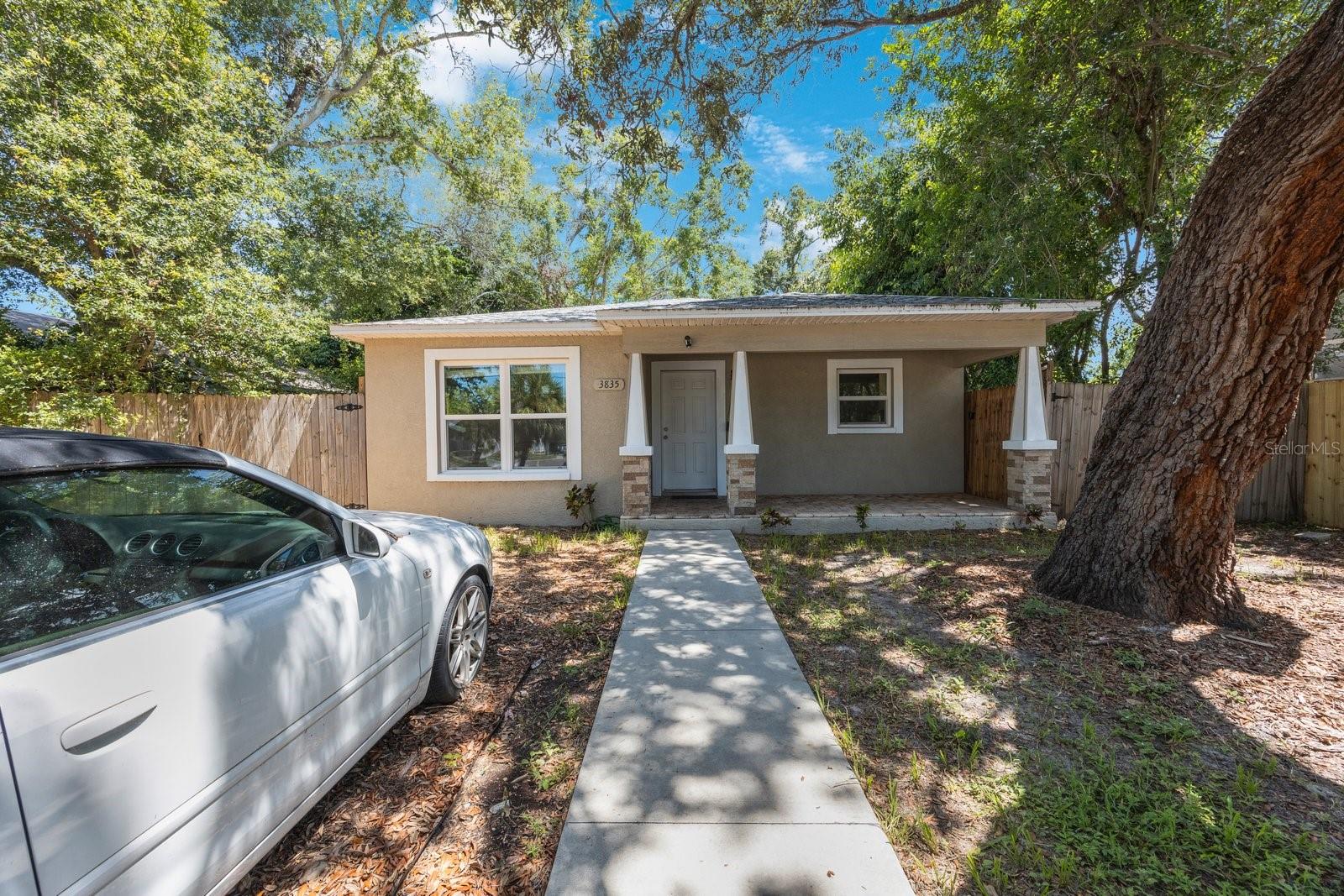 Centrally located between desirable downtown St Pete and our famous sugar sand beaches, this South Central area is St Petersburg’s best kept secret! Add a home that was built in 2020 and has 4 bedrooms and 2 full baths, you have it all! Curb appeal abounds as you approach the home, and the paver front porch invites you to sit and enjoy! Once inside, you are greeted with laminate flooring which flows throughout the living area for a seamless look. The open floorplan makes for easy entertaining in the living room which is open to the chef’s kitchen. With a kitchen that features lots of cabinets, ample countertops, newer stainless appliances and a subway glass tile backsplash, every element is in place. The eat in kitchen is perfect for family meals! After a long day, retire to the bedrooms, which are comfortable with nice closets. The primary suite bath is both functional and attractive, and the 2nd bath is well equipped as well! Laundry day is a breeze in the convenient laundry closet. Enjoy your morning coffee in the very private back yard. Beautifully fenced, it is a great space to kick back and relax with a good book or friends. Having a newer home provides peace of mind! Add the perfect location... just a few miles from St Pete Beach, Vibrant Downtown, the Pier, Gulfport, Pasadena, fine dining, world class golf, shopping, TIA and 275, and you have the perfect home!