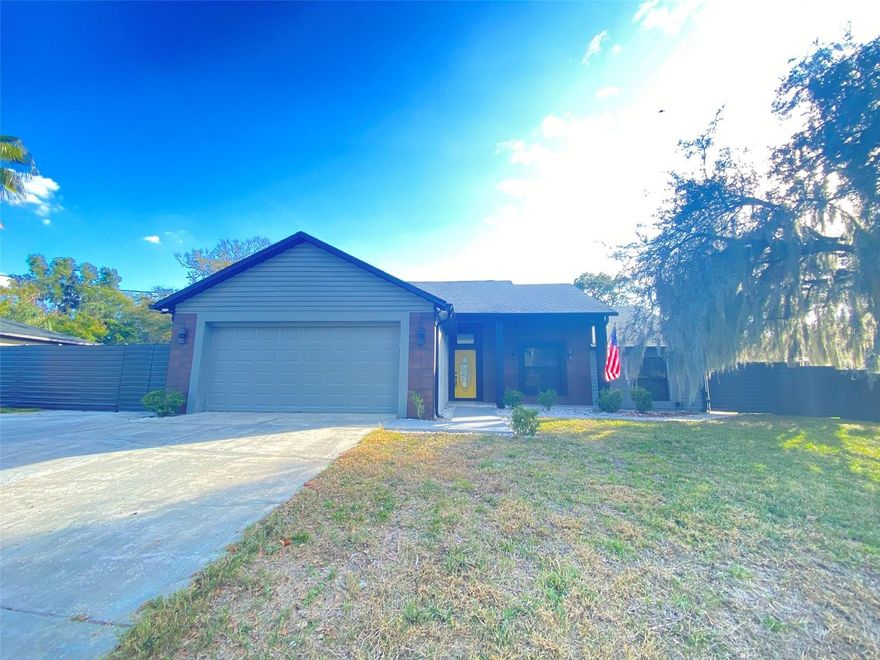 Spacious 3BR/2BA updated home on a large corner lot with a two car garage. Large living/dining combo, open floorpan, breakfast area in the kitchen with stainless steel appliances, and a closet pantry. The primary bedroom has a large walk in closet, and updated bathroom, with a brand new shower, bidet, vanity, and upgraded lighted mirror. The secondary bath is also updated. The huge fenced backyard has pavers and a gardening/planter box, and plenty of grassy areas. The John's Lake public boat ramp is just a few streets away, where you can enjoy fishing, kayaking or boating.