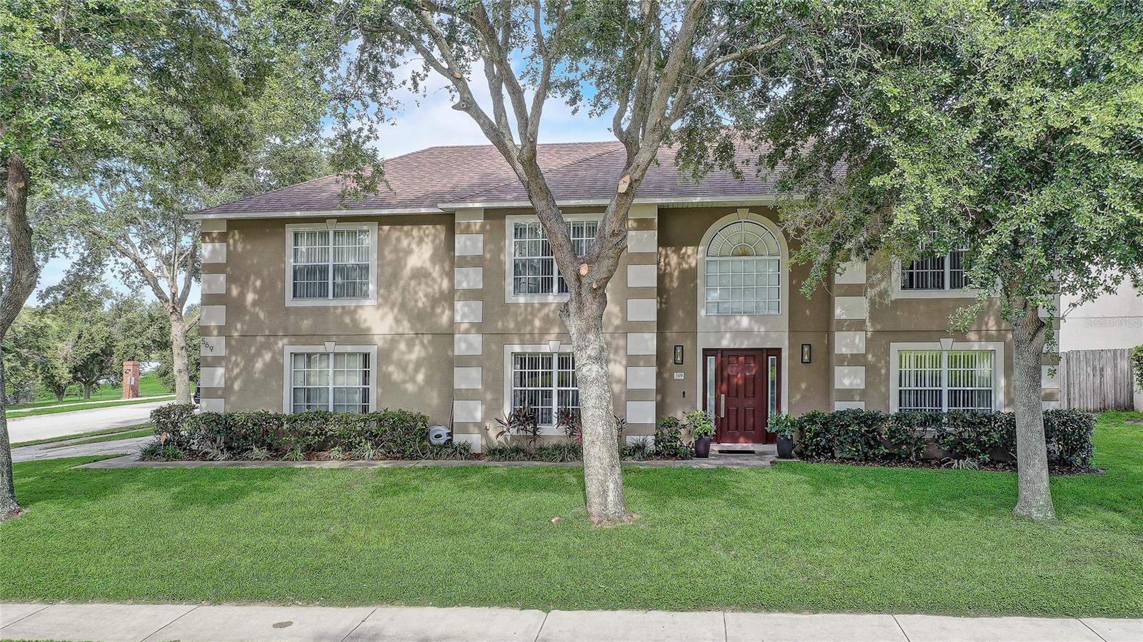 Welcome to 569 Yearling Cove Loop—this spacious 5-bedroom, 2.5-bath pool home in Apopka's sought-after Lake Doe Cove community offers the perfect blend of comfort, style, and functionality. Featuring over 2,900 square feet of living space, this beautifully maintained home boasts thoughtful upgrades throughout. Enjoy peace of mind with a newer roof (2020), dual A/C replacements (2021), and a smart hybrid water heater. The kitchen has been tastefully updated with quartz countertops and a modern backsplash, while all bathrooms feature renovated showers and updated tile work. The first floor has been fully retiled for a clean, contemporary look, and a whole-house water softener system adds extra value. Step outside to your private screened-in pool—perfect for Florida living! Located in a quiet cul-de-sac with low semi-annual HOA dues ($250), this home is zoned for Apopka Elementary, Wolf Lake Middle, and Apopka High School. Don’t miss the opportunity to own a move-in-ready gem in a peaceful, established neighborhood.