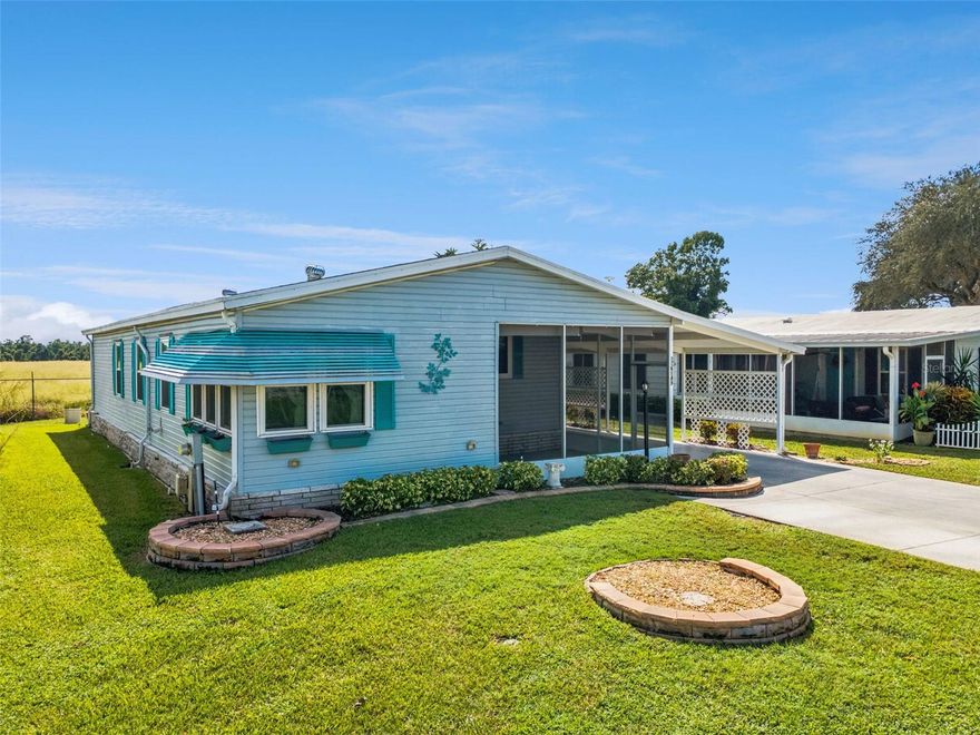 You own the land and very low cost HOA! Golf Cart included! Welcome to this move-in ready home in a highly sought-after 55+ community in Winter Haven, FL. Offering a peaceful, resort-style lifestyle, this home is perfectly situated in a serene neighborhood that boasts exceptional amenities, including a sparkling community pool & HOT TUB, clubhouse, and shuffleboard courts—all designed for your enjoyment and social connection.

Step inside to discover a bright and open living space with soaring cathedral ceilings that create an airy, welcoming atmosphere. The spacious UPDATED kitchen is ideal for cooking and entertaining, featuring newer stainless steel appliances, BOSCH Dishwasher, large single bay sink, recently remodeled kitchen with QUARTZ counters, and ample counter space for meal prep. Updated bathrooms, dual sink vanity, upgraded showers, this home is ready for you!

Enjoy your morning coffee or unwind in the evenings on the oversized screened front porch, a perfect spot to relax and take in the quiet surroundings. For the hobbyist or DIY enthusiast, a dedicated workshop with Laundry Tub space adds extra value and versatility to this already exceptional home.

Key Features:

New Front Entry Door, 

Extra wide driveway,

Large attached workshop with utiliity sink and electric,

Carport is over 40 feet long for extra covered parking,

Energy Efficient Vinyl Double Pane Windows throughout.

HVAC 2015,

Roof replaced in 2011,

2017 Water Heater,

Newer Luxury Vinyl Floors,

Irrigation system for easy lawn maintenance,

Oversized walk-in closet in the primary bedroom,

New light fixtures and ceiling fans throughout,

Upgraded "comfort height" toilets,

Best of all, this is a land-owned property—no lot rent!

This home offers the perfect blend of comfort, style, and low maintenance living in a welcoming community. Whether you're looking for a full-time residence or a seasonal retreat, this property is ready to welcome you home.

Don’t miss out—schedule your tour today!