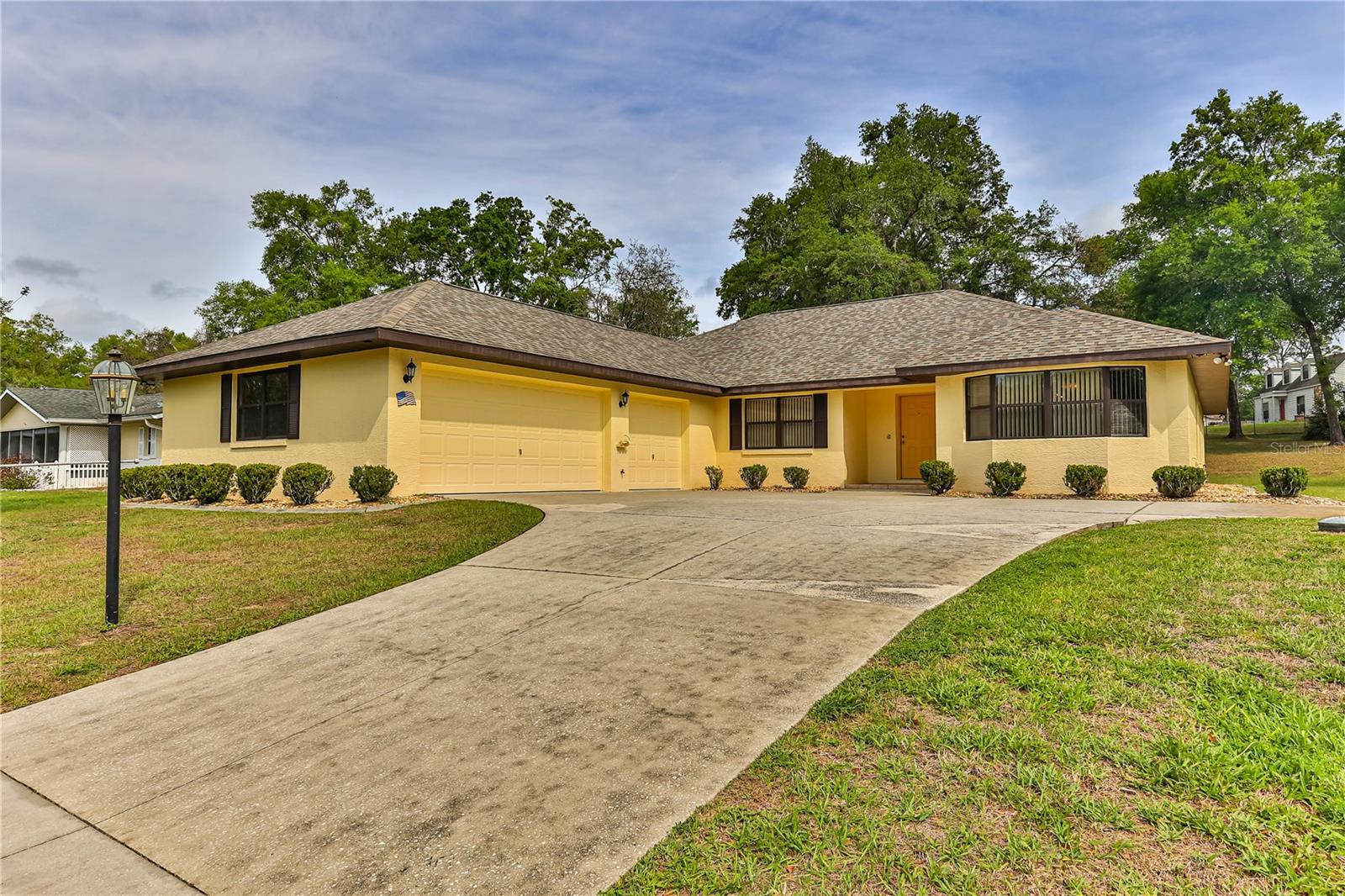 Welcome to this delightful three bedroom two bath home with a three car garage, nestled on a spacious .44 acre lot in the serene community of Floral City, Florida. Roof is May 2023. Located on a quiet and inviting street, this well-maintained home offers a perfect blend of comfort and convenience. As you enter, you’ll immediately appreciate the bright and airy floor plan, ideal for both relaxing and entertaining. This spacious living room flows seamlessly into the dining area and kitchen, creating an inviting atmosphere for family gatherings, and every day living. The kitchen features nice appliances, a solar tube that offer a lot of light, plenty of counter space with breakfast bar, and ample storage, making meal prep a breeze. The primary suite provides a peaceful retreat with an en suite bathroom and office space. Two additional bedrooms, offer plenty of space for family and guests. The second bathroom is conveniently located for easy access for the guest bedrooms and also has a solar tube for natural lighting. Inside laundry room. Outside, enjoy the expensive yard with lots of room to garden, or add a pool. The properties .44 acre lot is also fully fenced and provides a wonderful outdoor enclosed lanai to relax and take a natural beauty of the yard. Located just a few miles from local parks, shops, and restaurants, this home offers the perfect balance of privacy with only a handful of homes on the street. This home was very well taken care of. Don’t miss the opportunity to own this charming home, schedule a showing today.