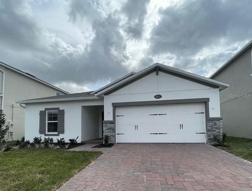 Beautifully maintained 4-bedroom, 2-bath home in the desirable Eden at Crossprairie community . This property offers a perfect combination of modern design and functionality. Step inside and fall in love with this charming and cozy house, where comfort meets style in every corner.”  The open-concept floor plan features a spacious living area filled with natural light, ideal for both everyday living and entertaining. The kitchen includes stainless steel appliances, solid-surface countertops, a large center island, and ample cabinet space. The primary suite provides a private retreat with a generous walk-in closet and a well-appointed an suite bathroom featuring dual vanities and a walk-in shower. Three additional bedrooms offers flexibility for family, guests, or a home office.  Enjoy time with family and friends or have a nice night outdoor living with a covered lanai complete with an electric chimenea, creating the perfect outdoor space for relaxing or hosting gatherings year-round. Prime location close to shopping, dining, major highways—offering easy access to Lake Nona, Orlando, and surrounding areas.