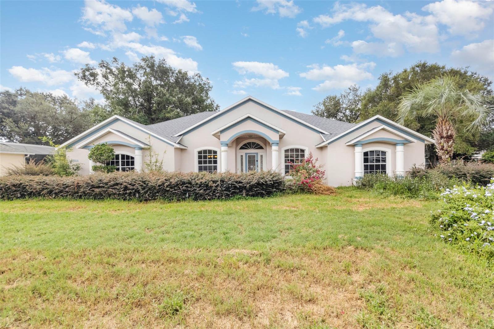 One or more photo(s) has been virtually staged. Welcome to 11808 Ridge View Cir in beautiful Clermont, Florida! This impressive 4-bedroom, 3-bathroom home boasts over 2,400 square feet of living space and is nestled within the sought-after Lake Ridge Club community, offering both privacy and peace of mind. There is a community pool, clubhouse and boat/RV storage available. With its spacious layout, oversized bedrooms, and expansive common areas, this home provides the perfect canvas for your personal touches and creative vision. As you step through the front door, you’re immediately greeted by a generously sized foyer and open-concept living and dining areas that flow seamlessly into a spacious family room ideal for hosting guests, movie nights, or cozy evenings at home. Natural light pours in through large windows, highlighting the home's open layout and airy atmosphere. The kitchen offers ample cabinetry, a large pantry, and plenty of counter space for meal prep or entertaining. There's also a casual dining area that overlooks the backyard, perfect for morning coffee or casual family meals. Each of the 4 bedrooms is generously sized, providing plenty of room for relaxation, play, or productivity. Whether you need a home office, guest suite, or private retreat, this home has the flexibility to accommodate your lifestyle. The primary suite is a true standout, featuring an oversized layout, a spacious en-suite bathroom, and a large walk-in closet that will more than satisfy your storage needs. Additional bedrooms also offer large closets, giving everyone the space they need to stay organized and clutter-free. With 3 full bathrooms, there's no shortage of comfort and convenience for family and guests alike. A large 2-car garage with laundry hookups and plenty of storage options add to the home’s practical appeal. This home presents a fantastic opportunity for a buyer to freshen it up and make it truly shine. Whether you're a growing family or someone looking to invest in a home with great bones in a desirable community, this property delivers on space, value, and potential. Outside, the home sits on a quiet cul-de-sac with a spacious yard ready for your landscaping ideas or outdoor entertainment dreams. Enjoy the tranquility of a quiet subdivision while being just minutes from Clermont’s many offerings. Living in Clermont means you're close to it all, from beautiful nature escapes like Richloam Wildlife Management and Crystal Springs to shopping, dining, and top-rated schools. Outdoor enthusiasts will appreciate the abundance of hiking, biking, kayaking, and fishing opportunities, while commuters will love the easy access to I-4, connecting you to Orlando and surrounding areas with ease. Don’t miss your chance to own a home of this size and potential in one of Clermont’s sought-after communities. Schedule your private showing today and imagine the possibilities that await at 11808 Ridge View Cir!