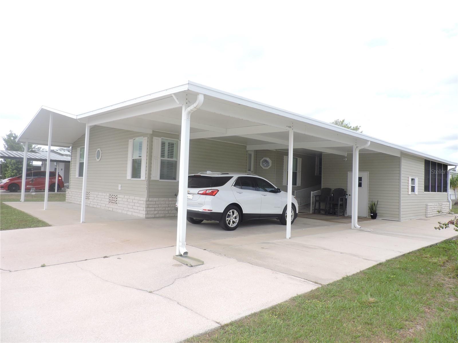 GREAT OPPORTUNITY TO BUY AN ABSOLUTELY IMMACULATE...MOVE IN READY 2 BEDROOM 2 BATH MANUFACTURED HOME. SITTING ON A NICE LOT IN CALOOSA LAKE VILLAGE, THIS SPACIOUS HOME HAS A SPLIT FLOOR PLAN AND A LARGE LIVING ROOM, DINING ROOM AND AN OFFICE, (OR POSSIBLE 3RD BEDROOM IF NEEDED). THE KITCHEN AND DINING AREA IS LIGHT AND BRIGHT WITH PLENTY OF COUNTER SPACE AND CABINETS, GOING OUT ONTO A GREAT FLORIDA ROOM. THERE IS ALSO A WORKSHOP/STORAGE AND COVERED CARPORT WITH EXTRA PARKING PAD. THIS HOME HAS IT ALL AND PRICED TO SELL. NO HOA FEES!!!!