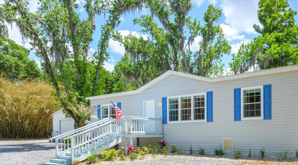 Photo of 30230 Palm Lane, Wesley Chapel, FL 33545 (MLS # TB8497266)