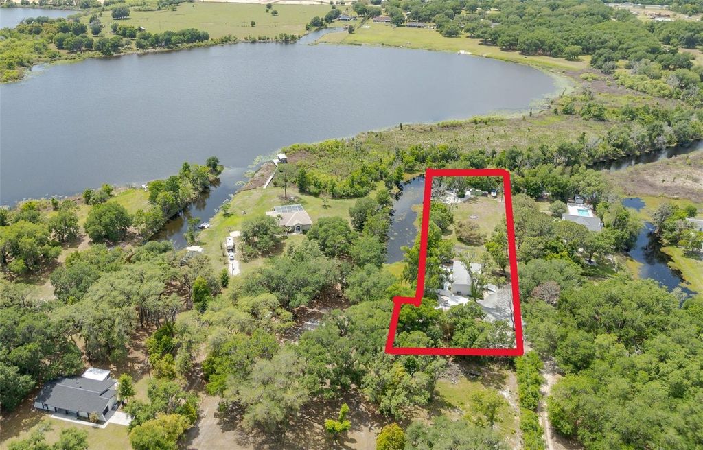 Photo of 30230 Palm Lane, Wesley Chapel, FL 33545 (MLS # TB8497266)